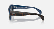 Blue sunglasses side view with dark gradient lenses and branded temple