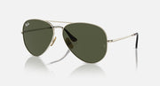 Ray-Ban aviator sunglasses with dark green tinted lenses and gold metal frame
