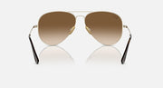 Ray-Ban aviator sunglasses with brown tinted lenses and gold metal frame, front view