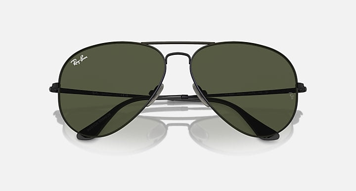 Aviator sunglasses with dark green lenses and matte black frame, mirrored front view