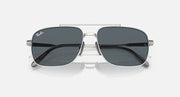 Silver metal wayfarer-style sunglasses with dark gray lenses and Ray-Ban logo