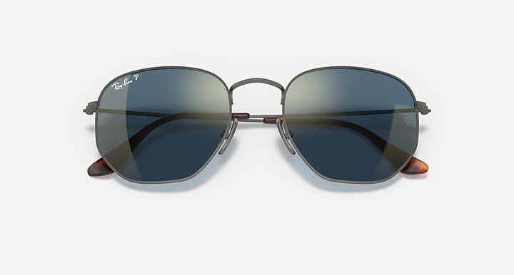 Ray-Ban hexagonal sunglasses close front, dark blue mirrored lenses, gunmetal frame