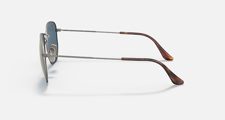 Ray-Ban sunglasses side view: gunmetal frame, dark blue mirrored lenses, brown temple tips