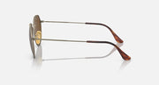 Round sunglasses side view with gold metal frame and brown gradient lens