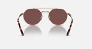 Ray-Ban Jack II round sunglasses with brown lenses, rose-gold frame, and tortoise arms.