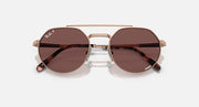 Ray-Ban Jack II round sunglasses with brown lenses, rose-gold bridge, and tortoise accents.