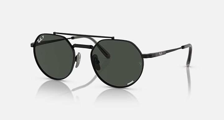 Ray-Ban Jack II round titanium sunglasses with dark green lenses and black frame.