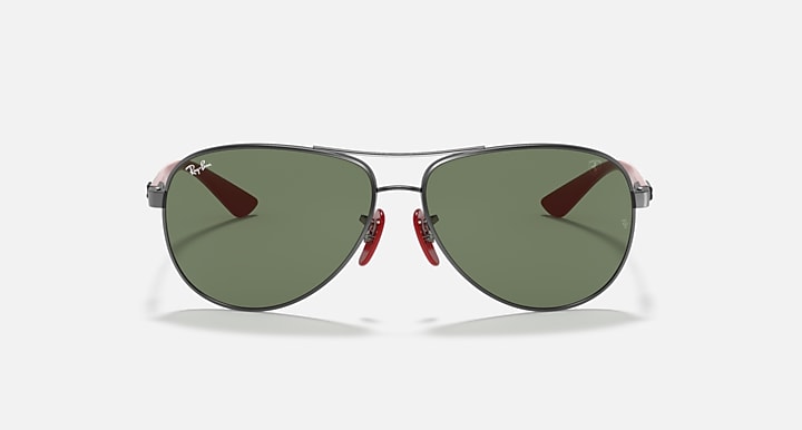 Ray-Ban aviator sunglasses front view, gunmetal frame with dark green lenses.