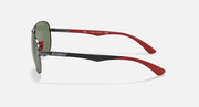 Ray-Ban aviator sunglasses side view, gunmetal frame with dark green lens and red temple.