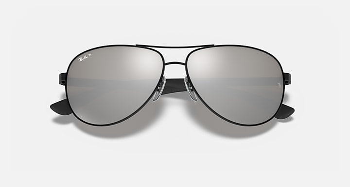 Ray-Ban aviator sunglasses, black frame with gray mirror lenses and curved metal bridge