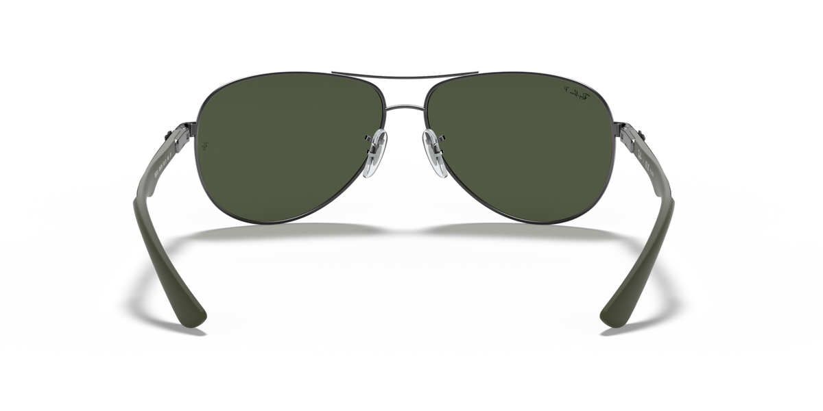 Ray-Ban aviator sunglasses with dark green lenses, bridge detail and metal frame