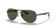 Ray-Ban aviator sunglasses with dark green lenses and metal frame, angled side view