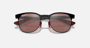 Ray-Ban sunglasses with dark frame and rose-brown mirrored lenses