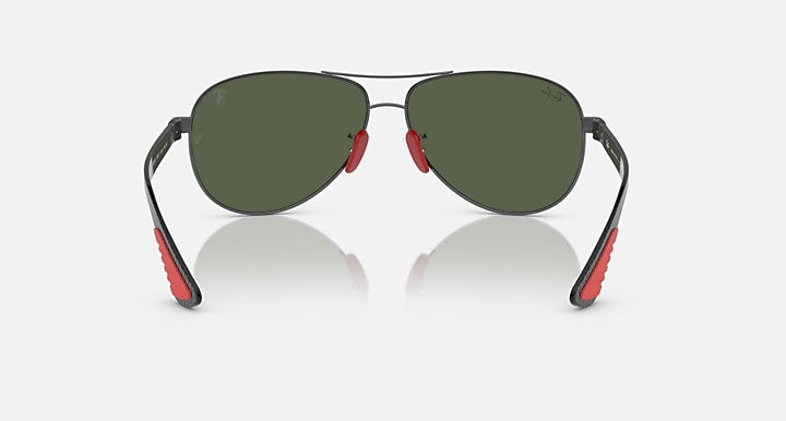 Ray-Ban aviator sunglasses, green lenses with red tip details on metal frame
