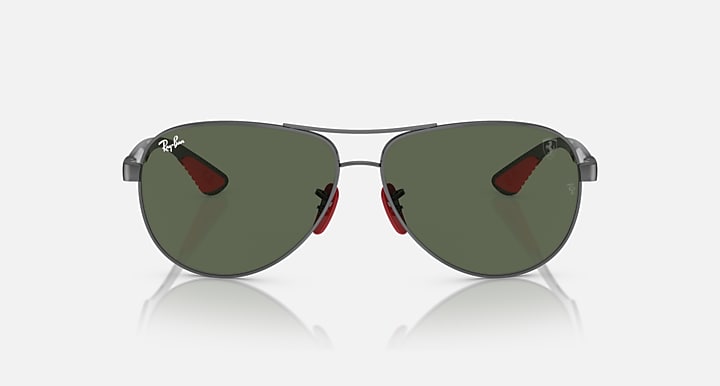 Ray-Ban aviator sunglasses, front view, dark green lenses with red inner accents