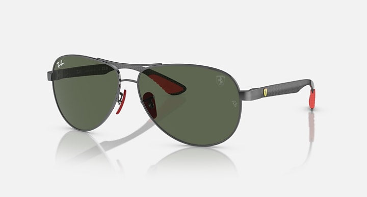 Ray-Ban aviator sunglasses with dark green mirrored lenses and dark metal frame