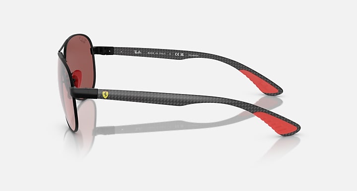 Ray-Ban aviator sunglasses side view, rose-pink lenses on silver metal frame
