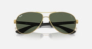 Gold-tone aviator sunglasses with dark green lenses and polarized mirrored band