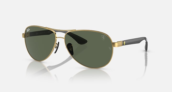Gold-tone aviator sunglasses with dark green mirrored lenses and polarized finish