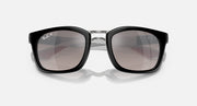 Ray-Ban sunglasses, close front view with black frame and brown gradient lenses