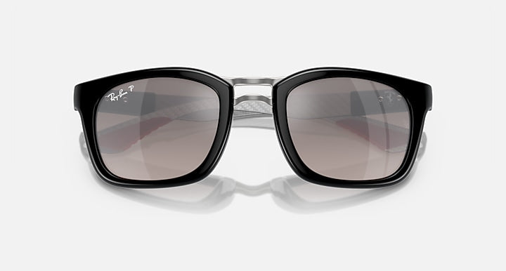 Ray-Ban sunglasses, close front view with black frame and brown gradient lenses