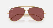 Ray-Ban aviator sunglasses, gold frame with maroon mirrored lenses and metal bridge.