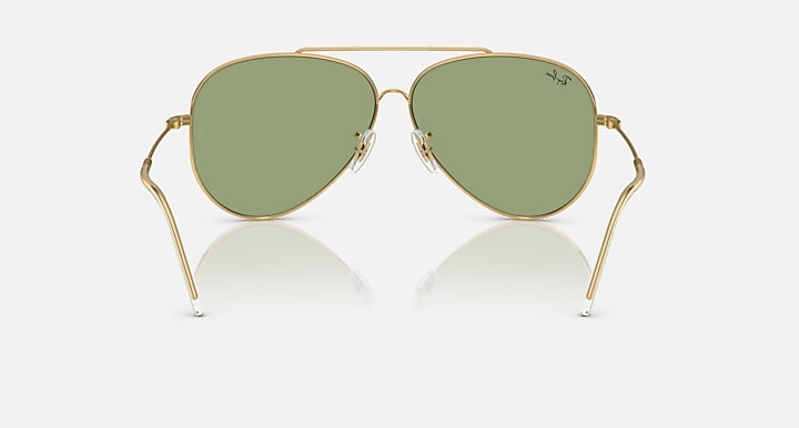 Ray-Ban aviator sunglasses with gold frame and green mirrored lenses, front view.