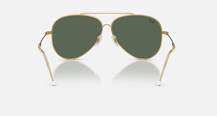 Ray-Ban aviator reverse sunglasses, front view, gold frame with dark green lenses
