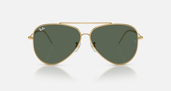 Ray-Ban aviator reverse sunglasses, front view, gold frame with dark green lenses