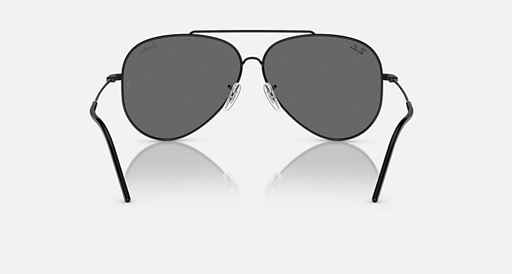 Aviator sunglasses front view with dark gray lenses and black metal frame arms