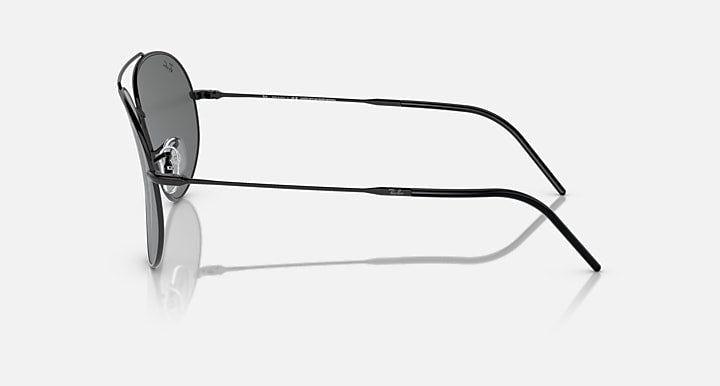 Aviator sunglasses side profile with dark gray lenses and thin metal temples
