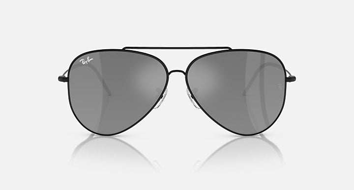 Ray-Ban aviator sunglasses with dark grey lenses and black frame, front view.
