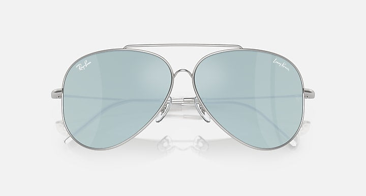 Aviator sunglasses with light blue lenses and silver metal frame, centered front