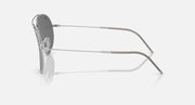 Ray-Ban aviator reverse sunglasses, silver frame, side view with dark lenses