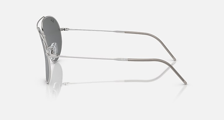 Ray-Ban aviator reverse sunglasses, silver frame, side view with dark lenses