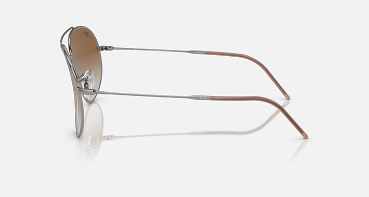 Ray-Ban aviator reverse sunglasses, gold frame, side view with brown lenses