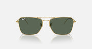 Ray-Ban Caravan Reverse sunglasses with dark green lenses and gold-tone frame, angled front.
