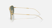 Ray-Ban Caravan Reverse sunglasses side view with gold-tone metal frame and dark green lenses.