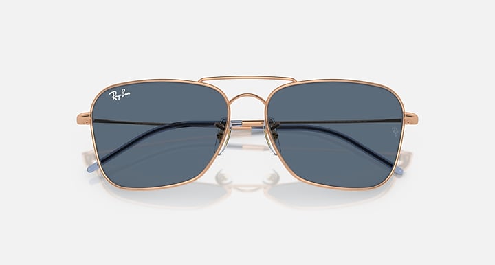 Caravan Reverse sunglasses with rose gold frame and dark blue tinted lenses