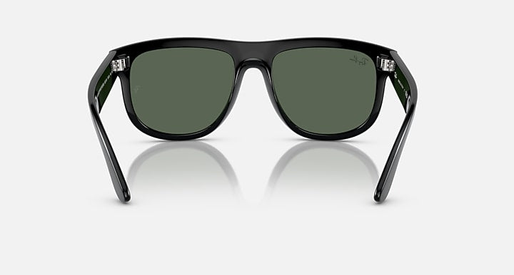 Ray-Ban sunglasses with black frame and dark green lenses, front view with metal accents.