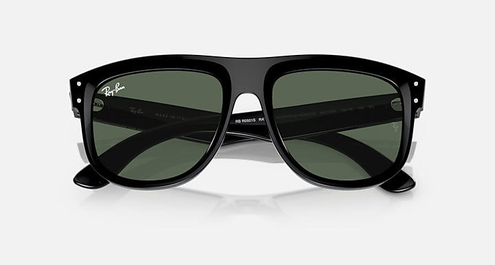 Ray-Ban sunglasses with black frame and dark green mirrored lenses, angled front view.