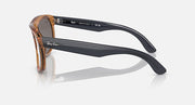 Ray-Ban brown and black sunglasses with curved temples and blue lenses