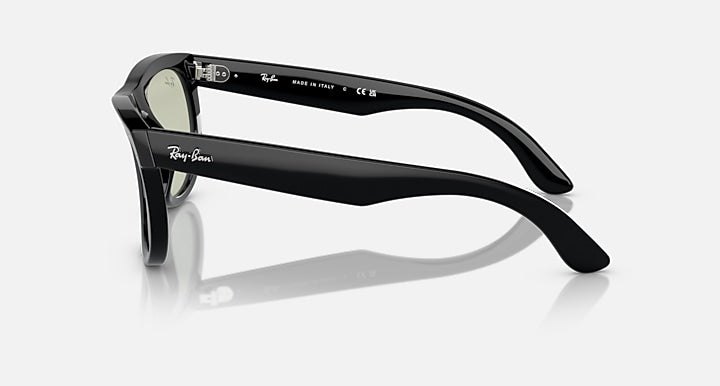 Ray-Ban Wayfarer sunglasses, side view with black frame and light green lenses