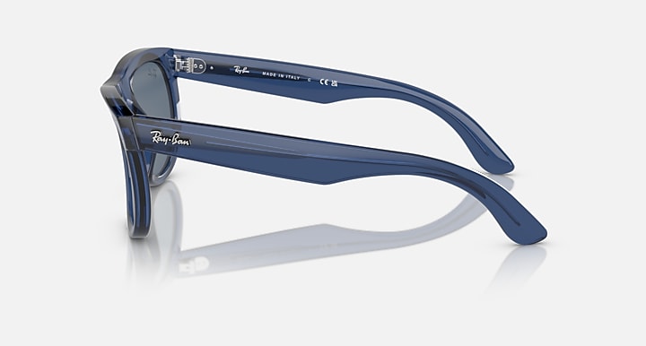 Ray-Ban Wayfarer sunglasses, side view with navy translucent frame and dark lenses
