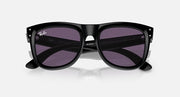 Ray-Ban sunglasses with black frame and purple mirrored lenses, open front angle