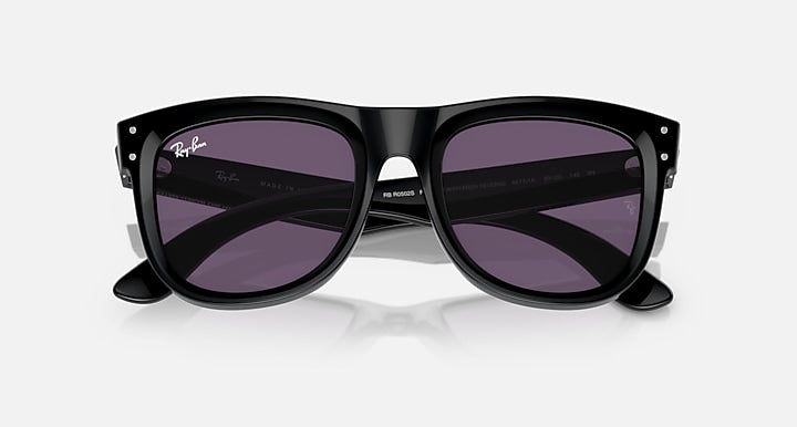 Ray-Ban sunglasses with black frame and purple mirrored lenses, open front angle