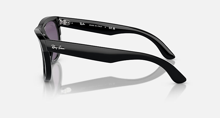 Ray-Ban sunglasses with black frame and purple mirrored lenses, side profile
