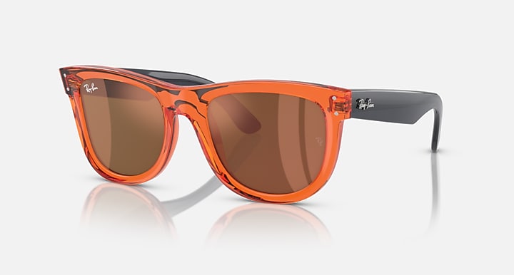Ray-Ban Wayfarer Reverse sunglasses, transparent orange frame with dark brown lenses