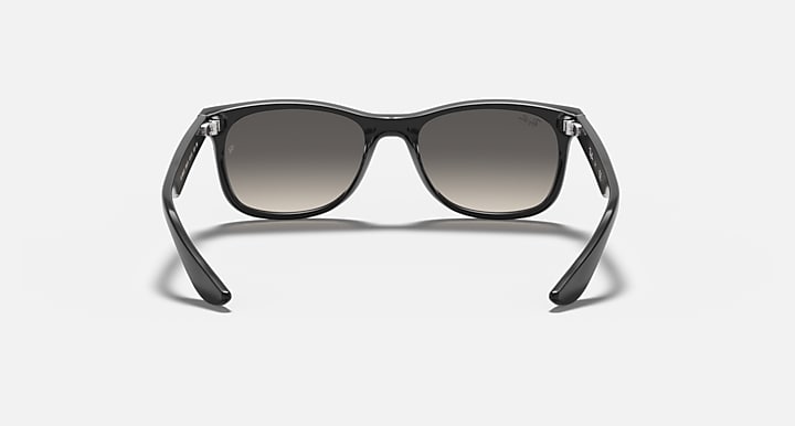Ray-Ban Junior wayfarer sunglasses, dark frame with smoky lenses, front view