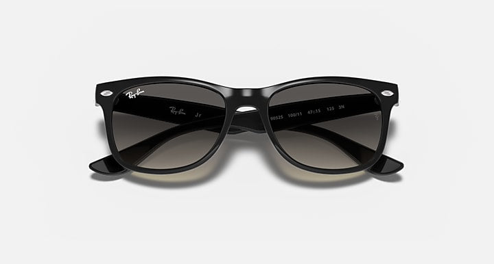 Ray-Ban Junior wayfarer sunglasses, black frame with dark lenses, front view